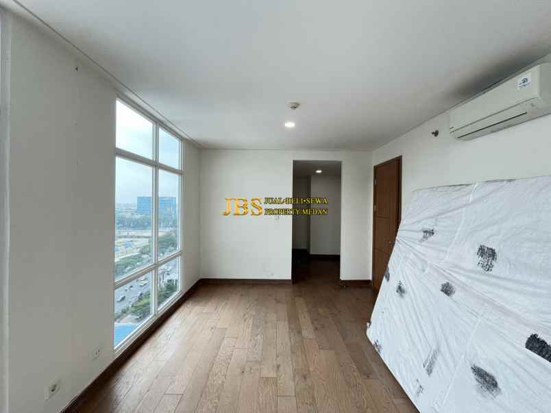 dijual apartemen the reiz condo