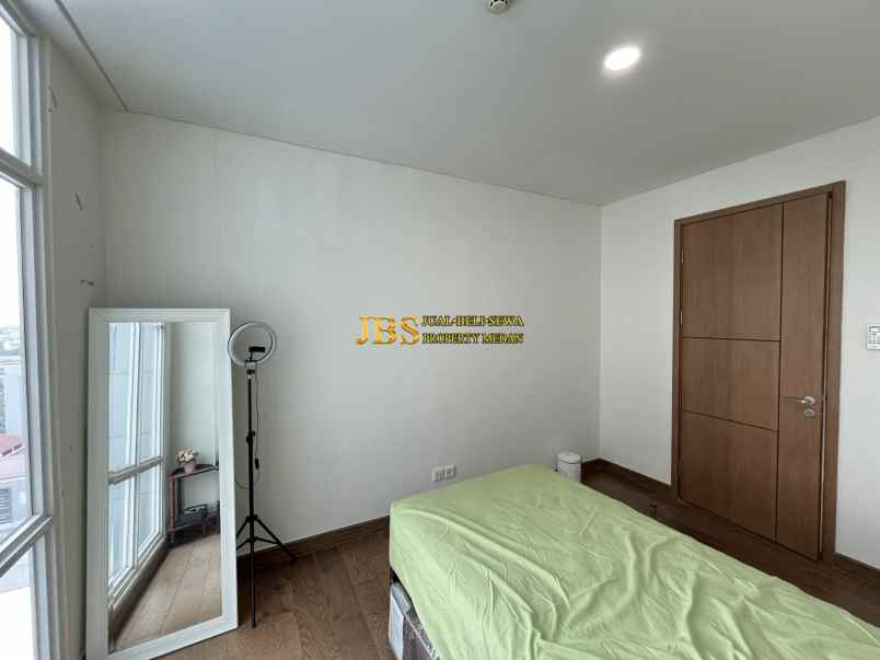 dijual apartemen the reiz condo