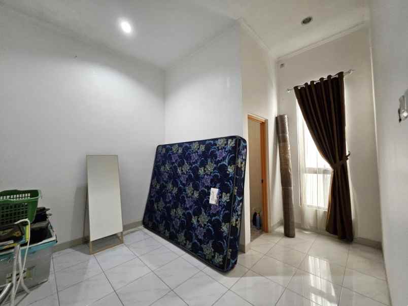 dijual rumah cluster harmoni perumahan