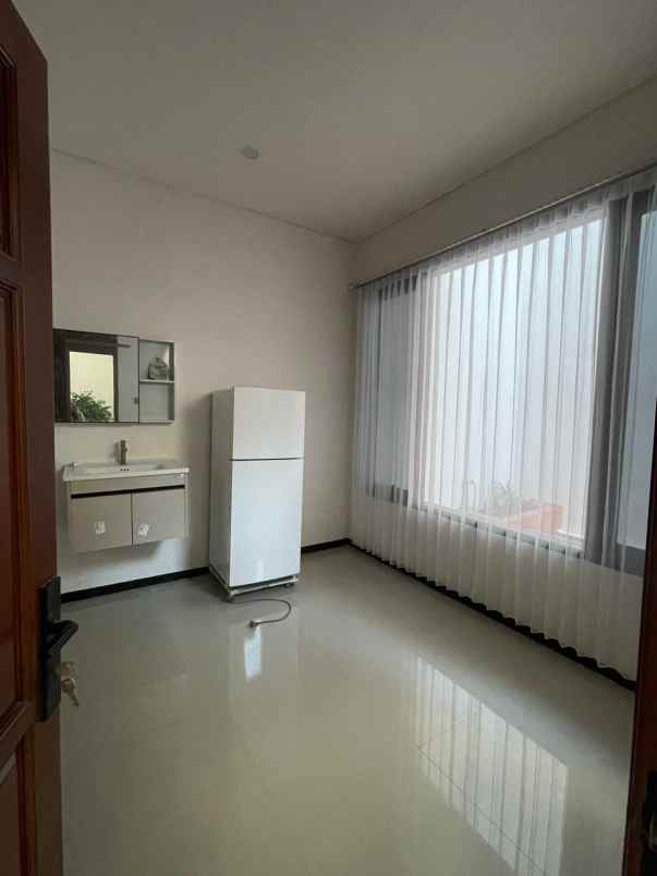 dijual rumah dharmahusada permai