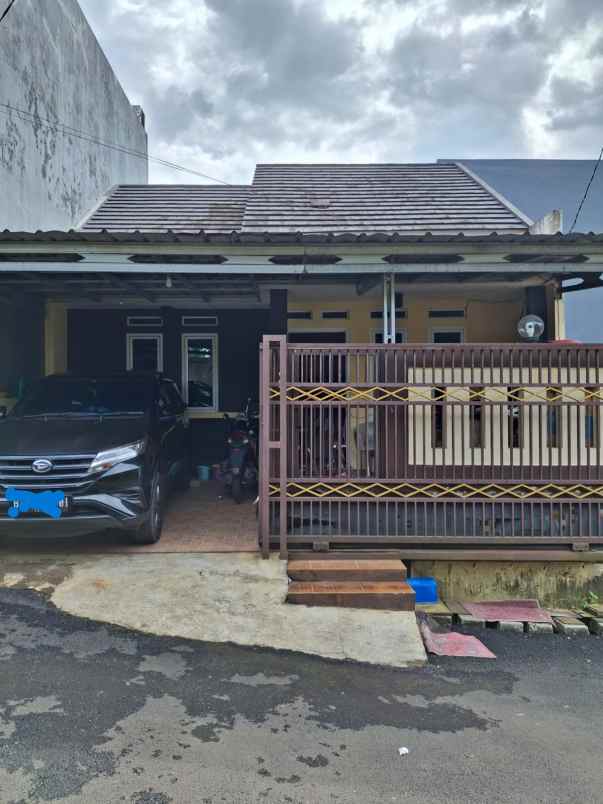 dijual rumah jalan raya meruyung limo