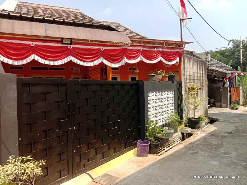 dijual rumah jalan raya pamulang