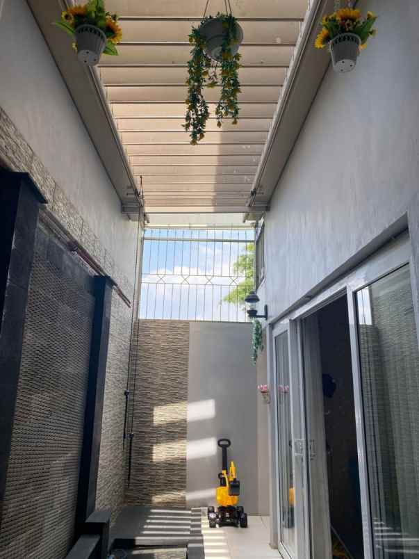 dijual rumah jln hj naman pondok kelapa