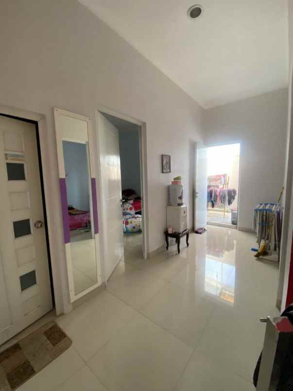 dijual rumah jln hj naman pondok kelapa