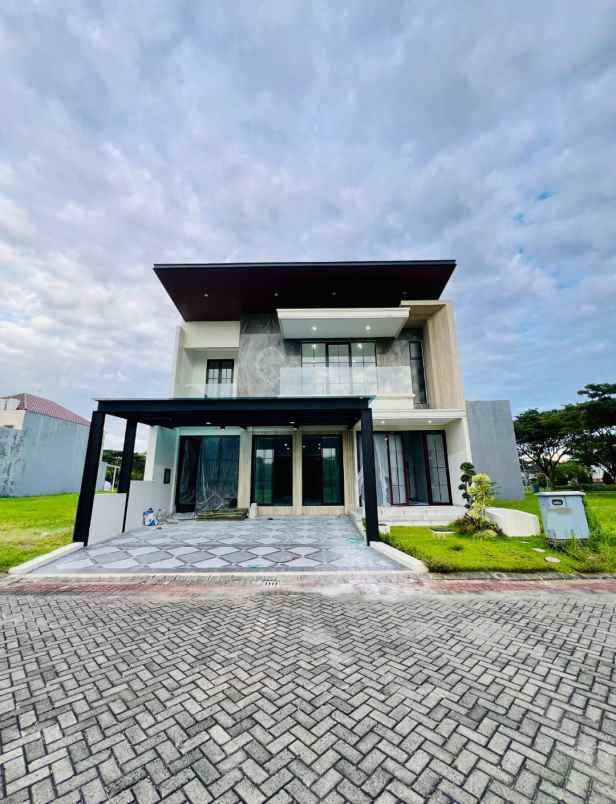 dijual rumah pakuwon city grand island