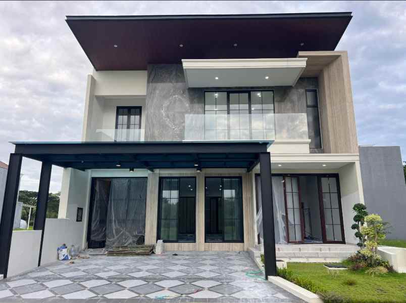 dijual rumah pakuwon city grand island