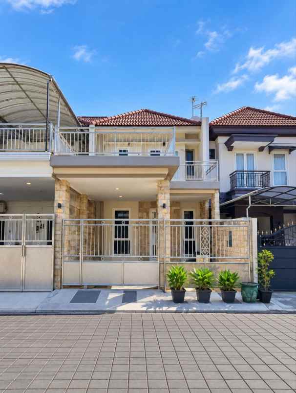 dijual rumah pantai mentari surabaya