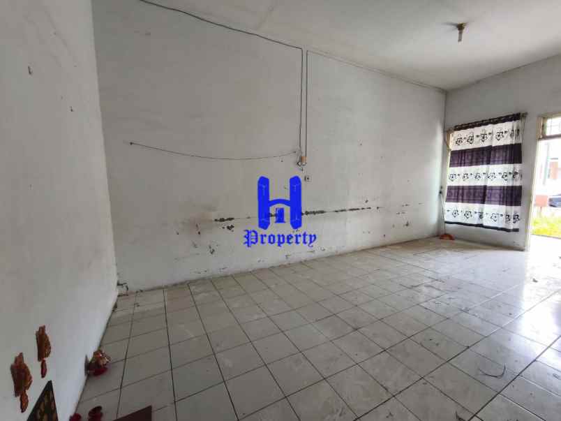 disewakan rumah komplek cemara hijau jalan