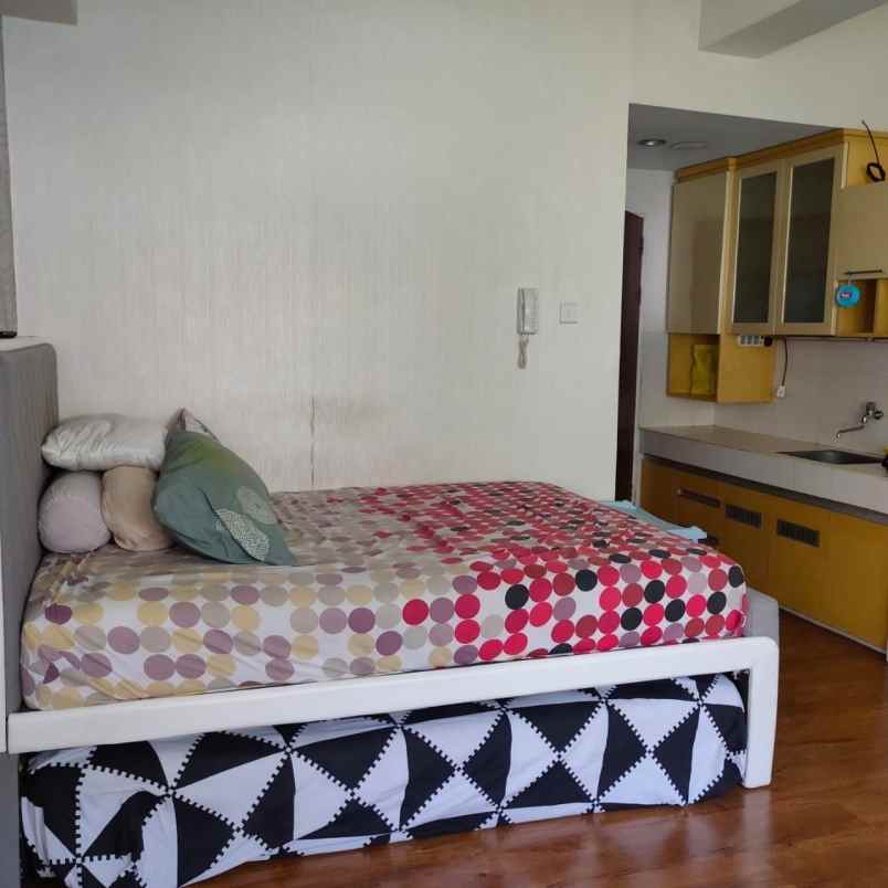 partemen cosmopolis yang tipe studio deluxe corner