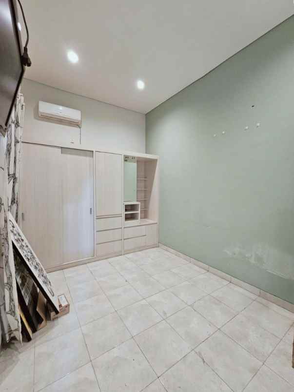 rumah cluster ifolia kota harapan indah bekasi