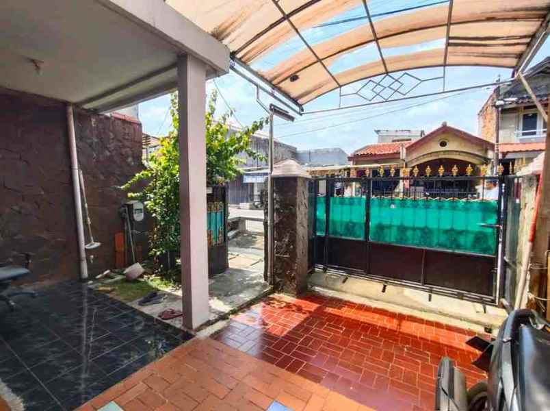 rumah pinggir jalan strategis di abadinaya depok