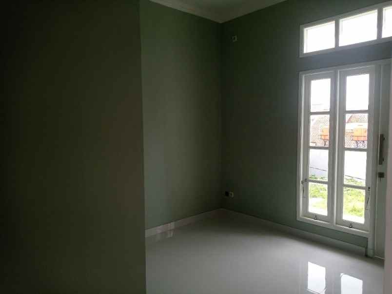 ahzavi rumah 2 lantai dekat gt jatiwarna