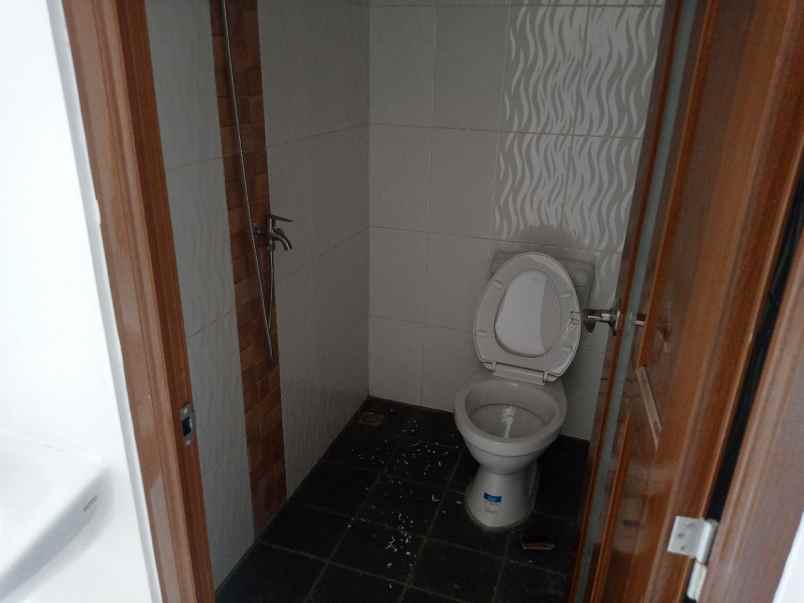 ahzavi rumah 2 lantai dekat gt jatiwarna