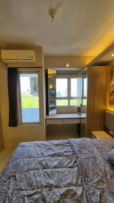 apartemen puncak permai surabaya barat