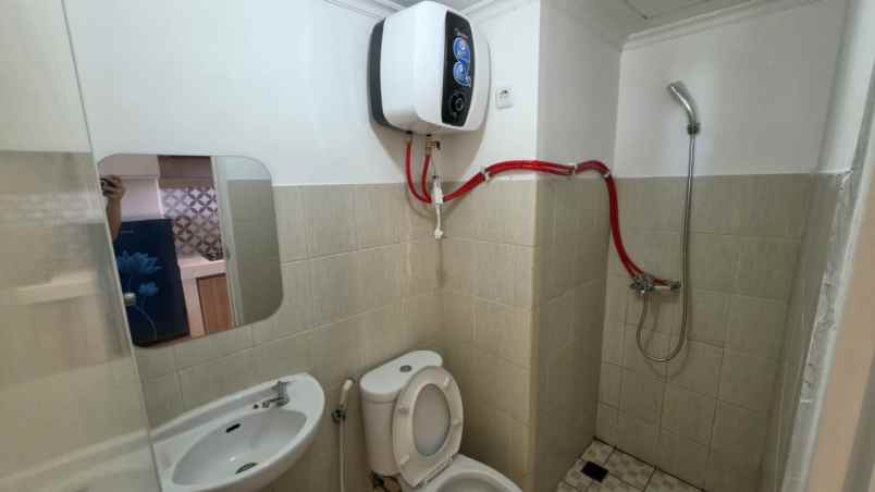 apartemen puncak permai surabaya barat