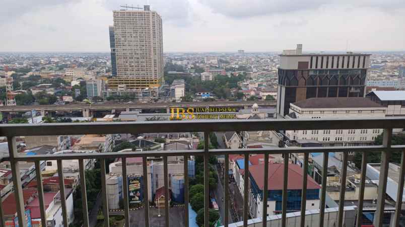 dijual apartemen podomoro city deli tower