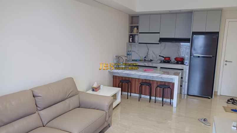 dijual apartemen podomoro city deli tower