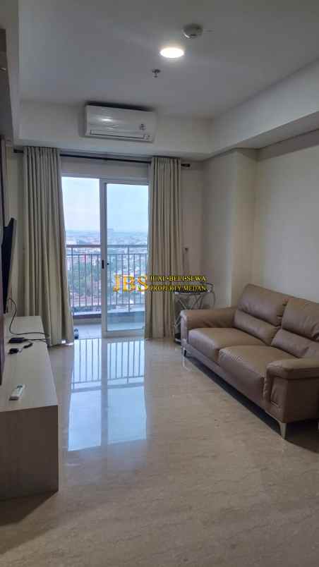 dijual apartemen podomoro city deli tower