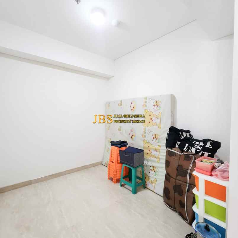 dijual apartemen podomoro city deli tower