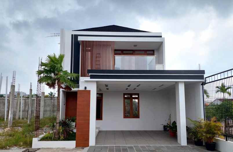 dijual rumah jalan amal mulia jalan