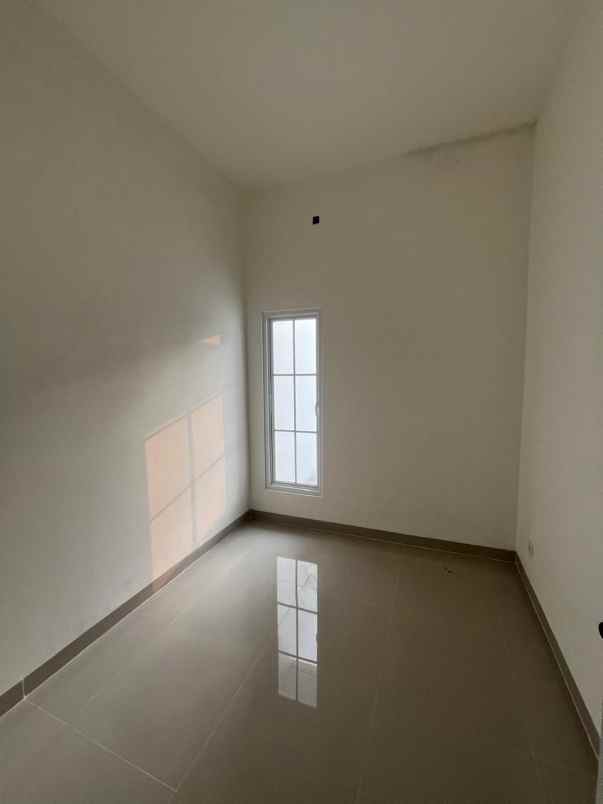 dijual rumah jalan raya benda baru