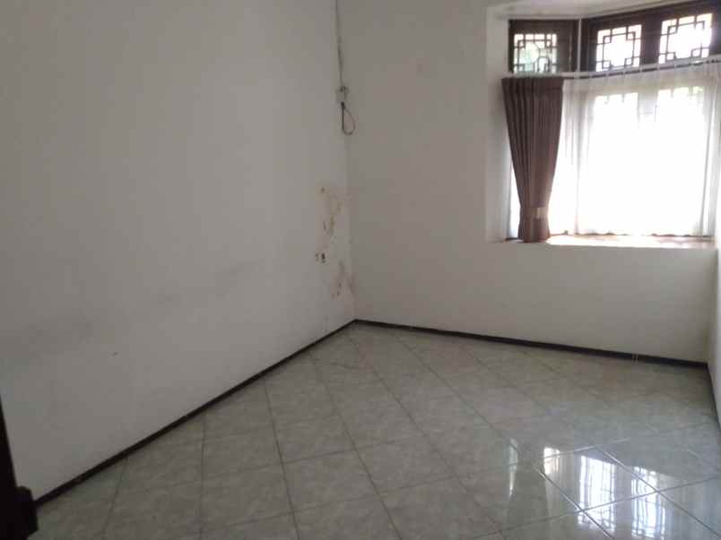 dijual rumah jl dharmahusada indah