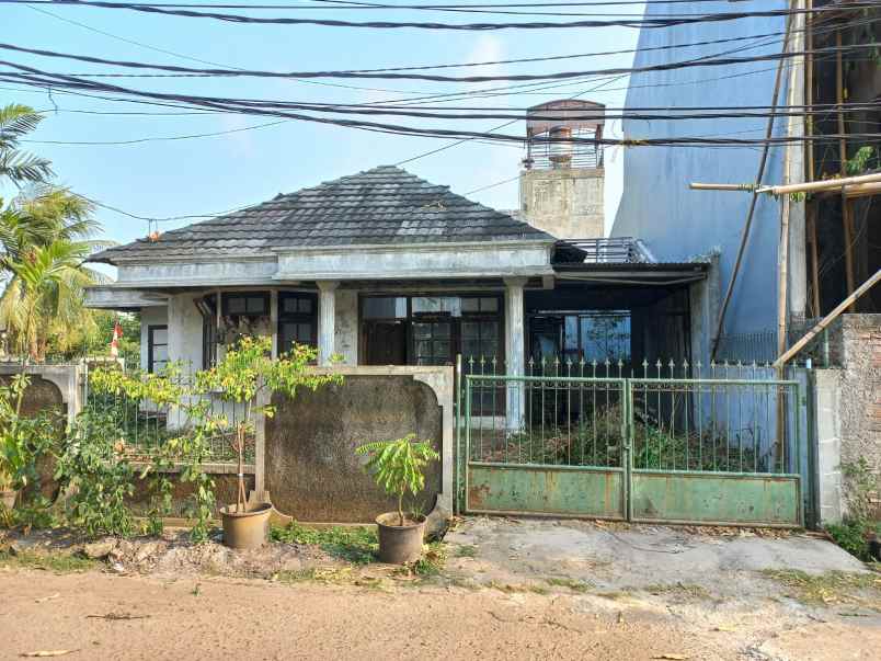 dijual rumah jl jatiwaringin pondok