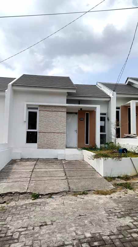 dijual rumah kota baru driyorejo