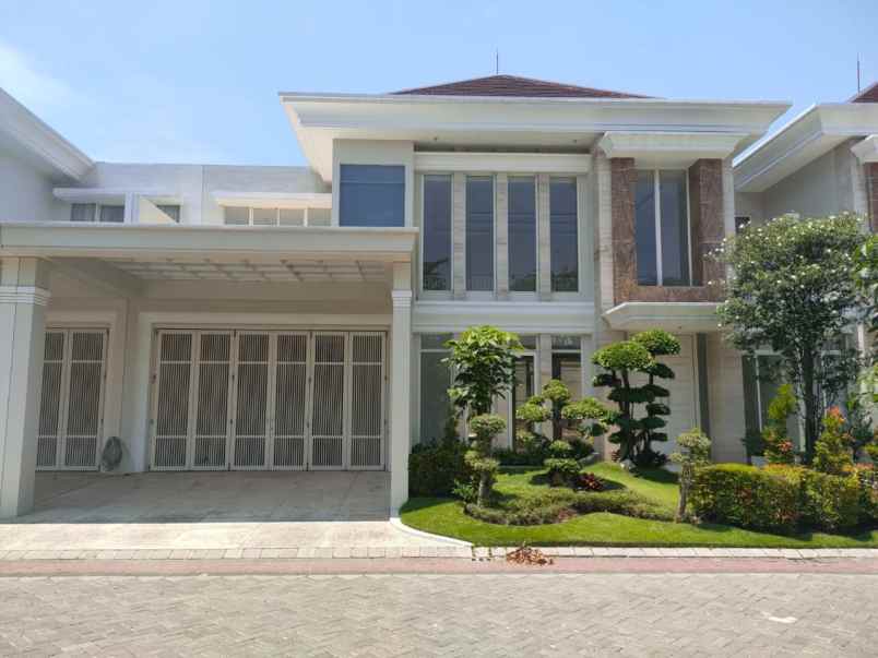 dijual rumah pakuwon city grand island