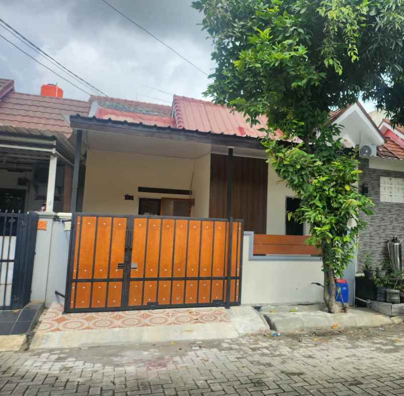 dijual rumah taman harapan baru