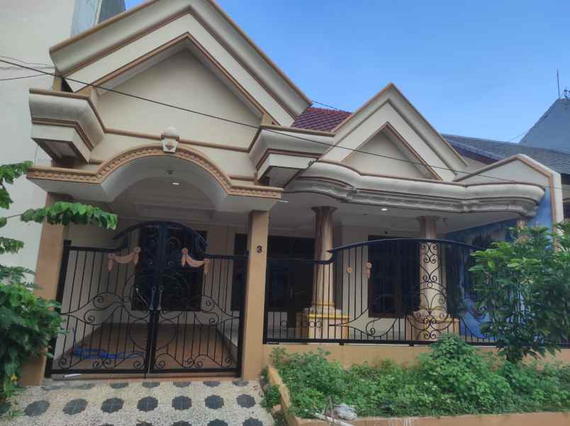 disewakan rumah jl babatan pantai timur 5