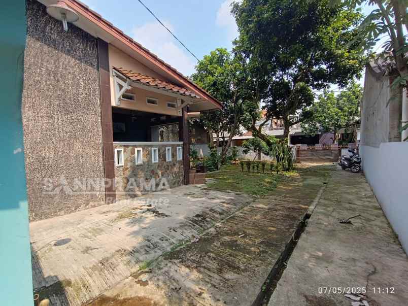 rumah dengan tanah luas dibelakang margo city