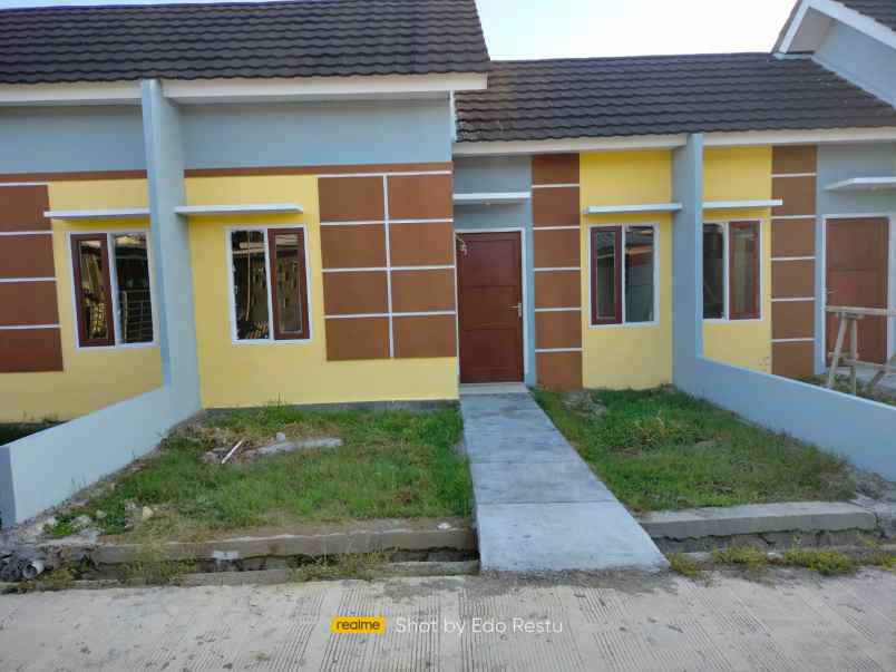 rumah jalan raya tanjung pura