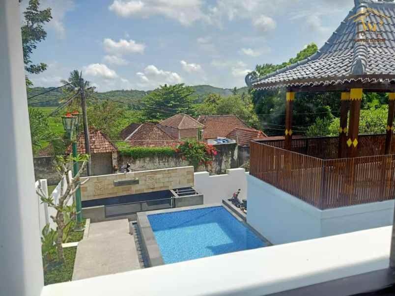 rumah joglo private pool di kasihan bantul view sawah