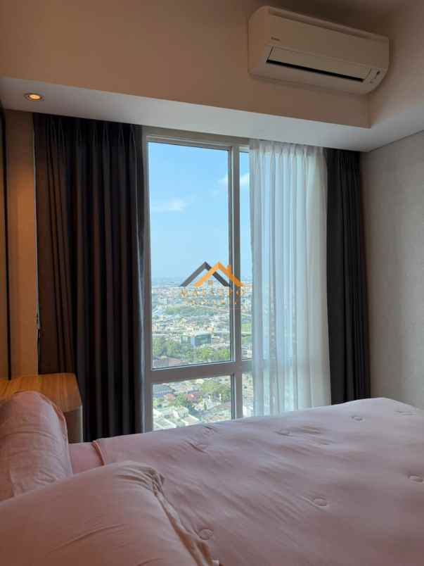 dijual apartemen podomoro city deli tower