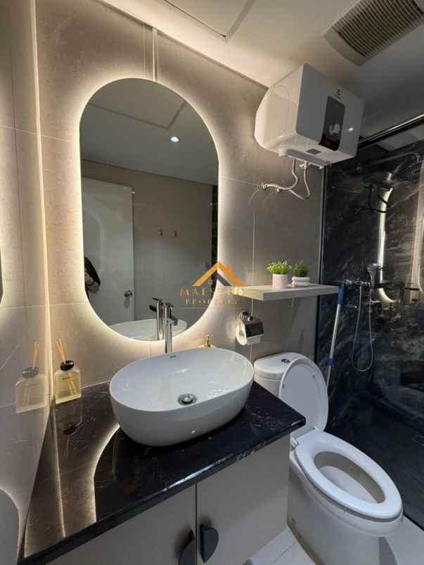 dijual apartemen podomoro city deli tower