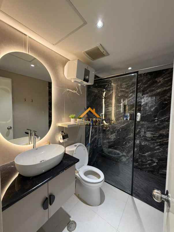 dijual apartemen podomoro city deli tower