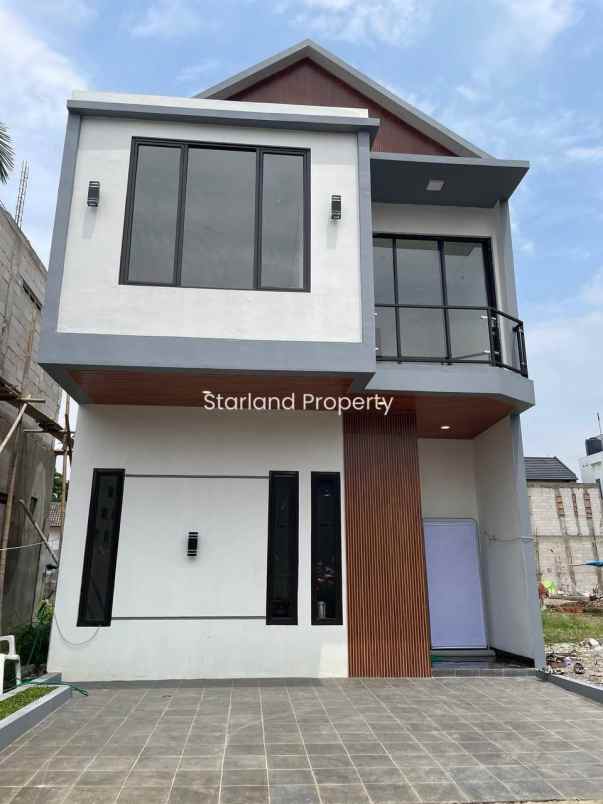 dijual rumah jalan graha raya dkt