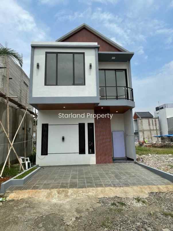 dijual rumah jalan graha raya dkt