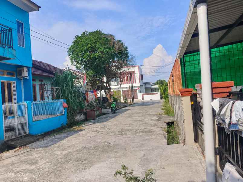 dijual rumah jl garuda sakti km2