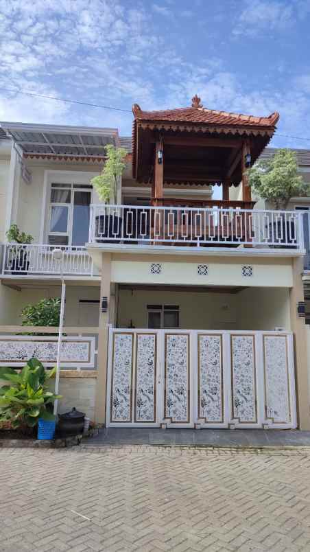 dijual rumah jl sam ratulangi