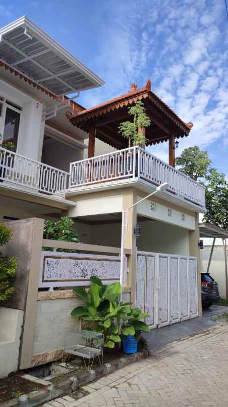 dijual rumah jl sam ratulangi