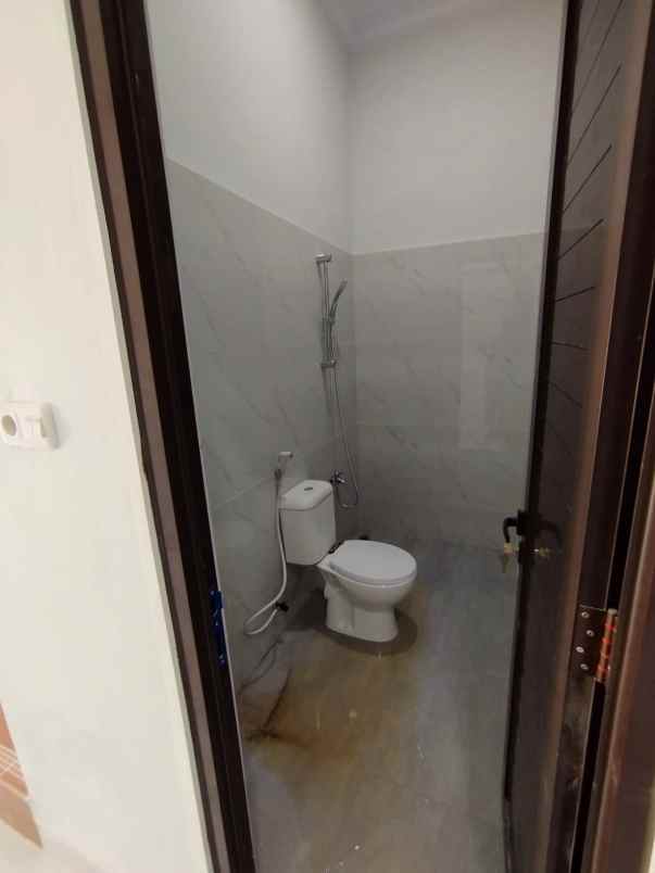 dijual rumah kota harapan indah bekasi