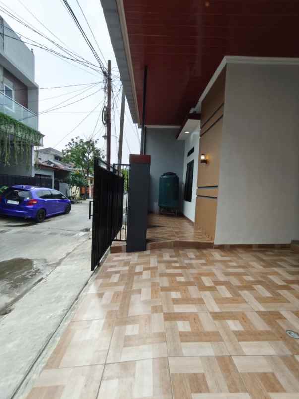 dijual rumah pesona anggrek harapan bekasi