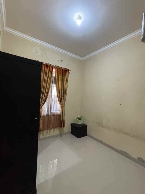 dijual rumah ratu jaya