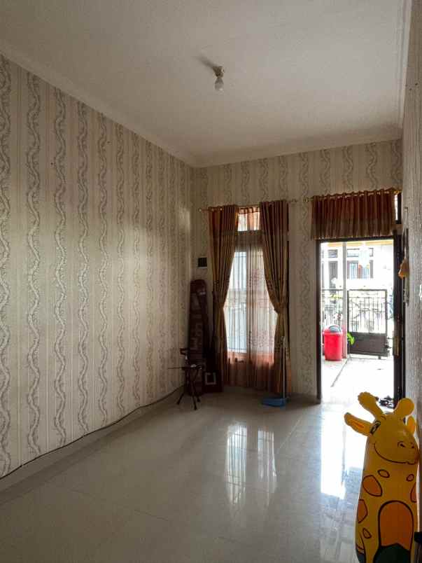 dijual rumah ratu jaya