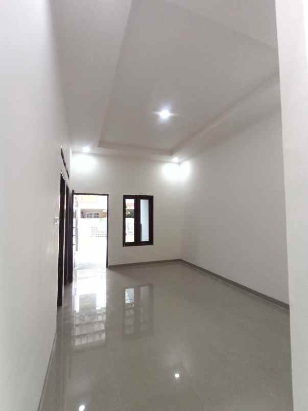 dijual rumah taman harapan baru