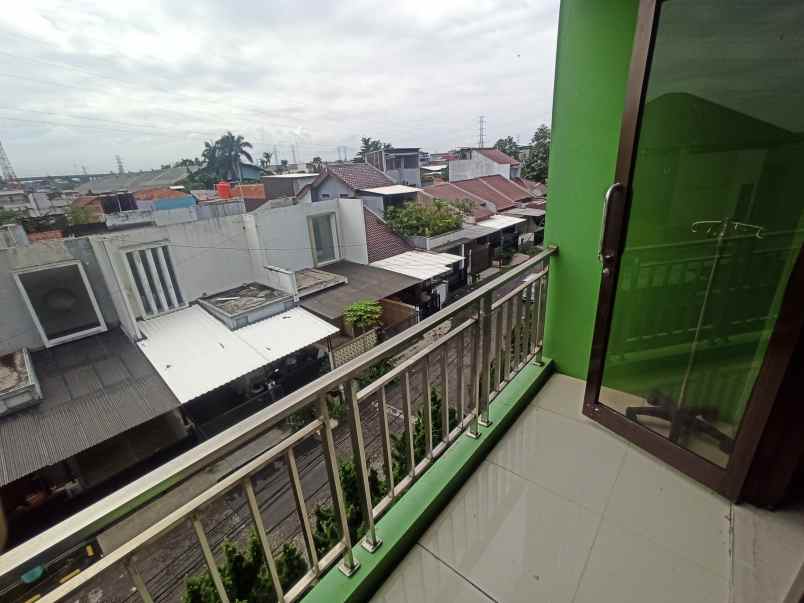 dijual rumah taman kopo indah