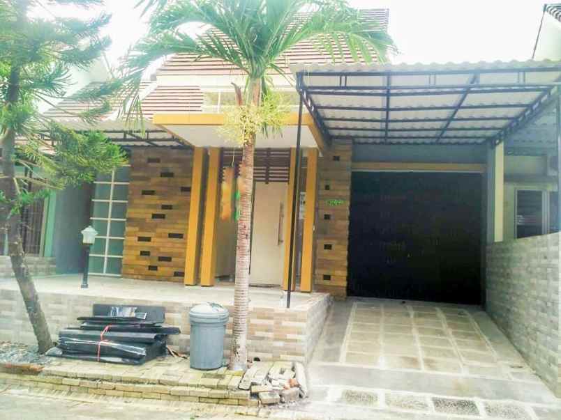 dijual rumah taman puspa raya citraland surabaya barat