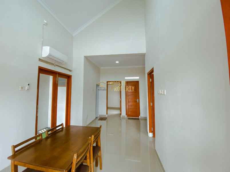 hunian rooftop stylish dengan carport dan smart lock